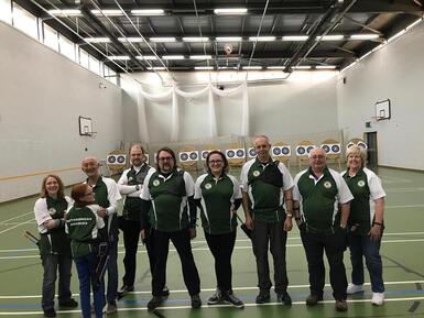 An image of club members at the indoor shooting venue